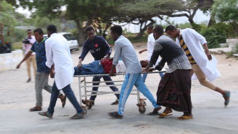 People carry a wounded person on a stretcher after a suicide attack in Mogadishu on Wednesday.