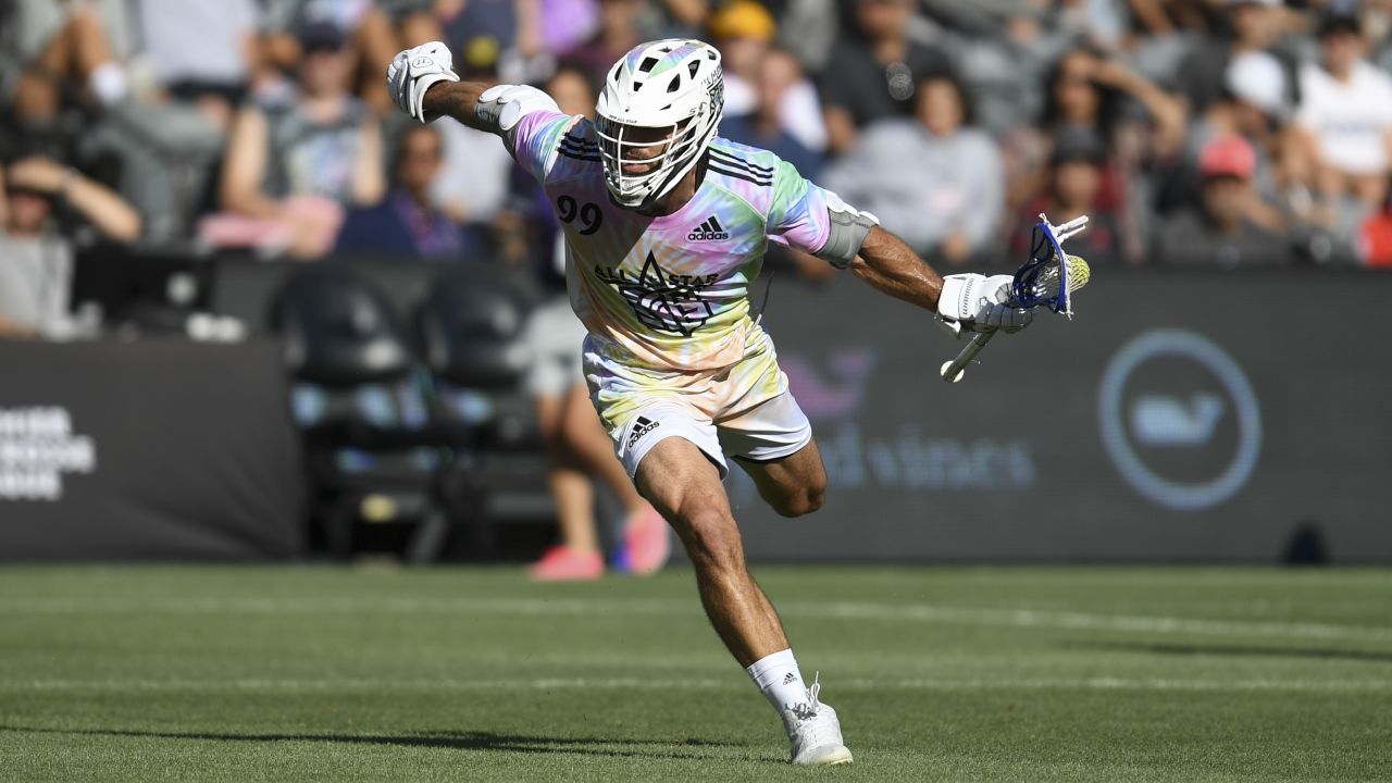 Team Baptiste's Paul Rabil carries the ball in the Premier Lacrosse League All-Star game.