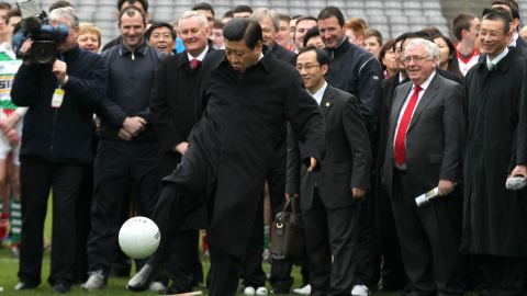 Xi Jinping, then the Chinese vice-president, kicks a  football in Dublin, in February 2012.