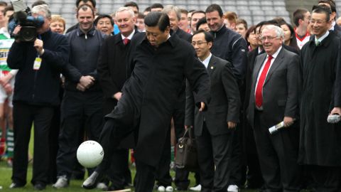 Xi Jinping, then the Chinese vice-president, kicks a football in Dublin, in February 2012.