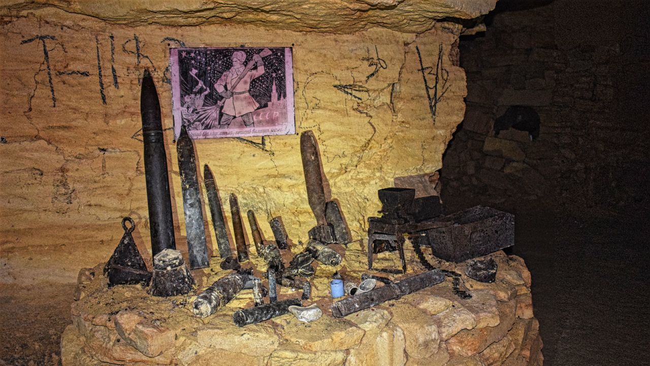 Various tools used for stone mining and Soviet memorabilia on display.