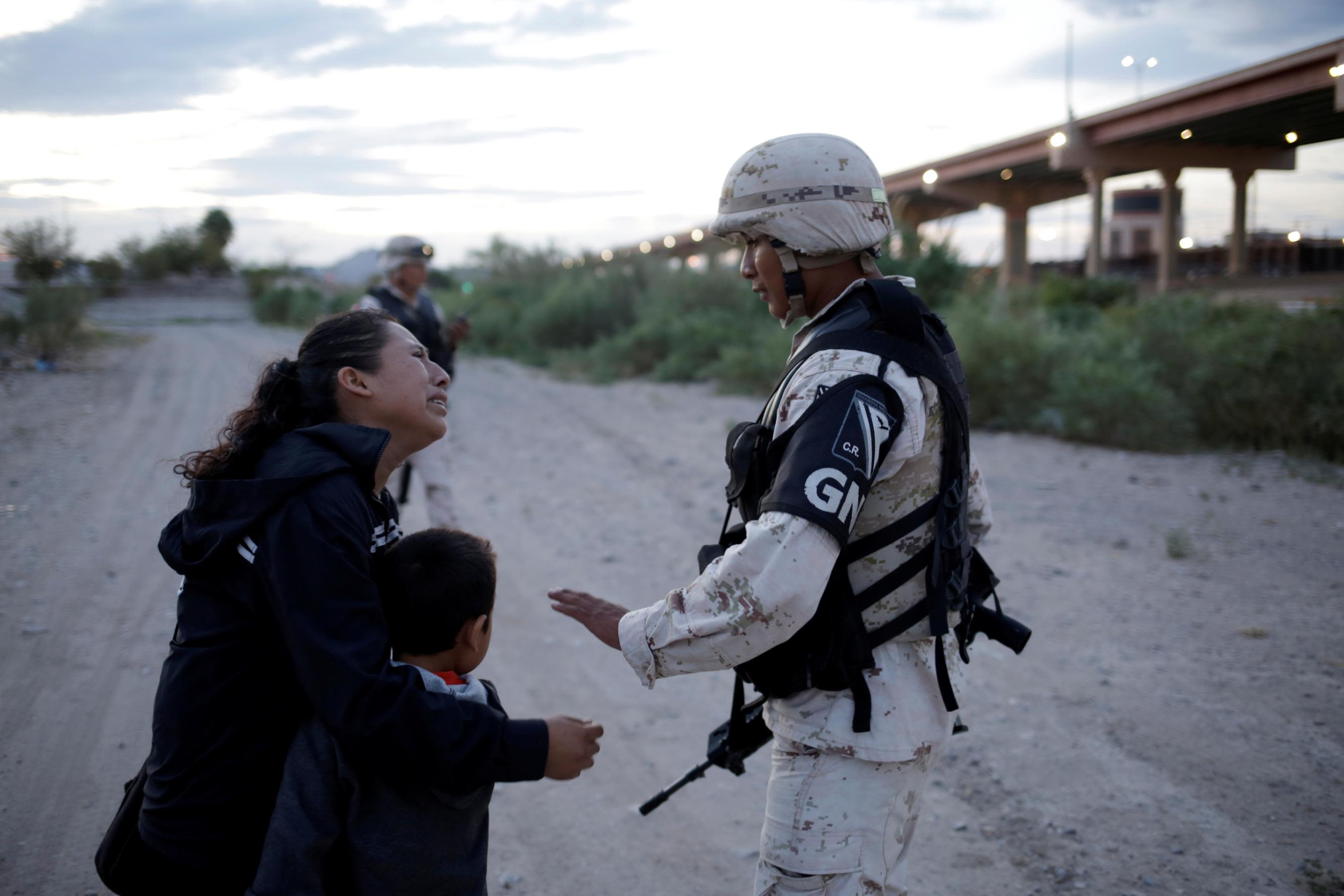 No Mercy In Mexico Video Guatemalan mother pleads with a Mexican soldier for mercy in new photos taken at US border | CNN