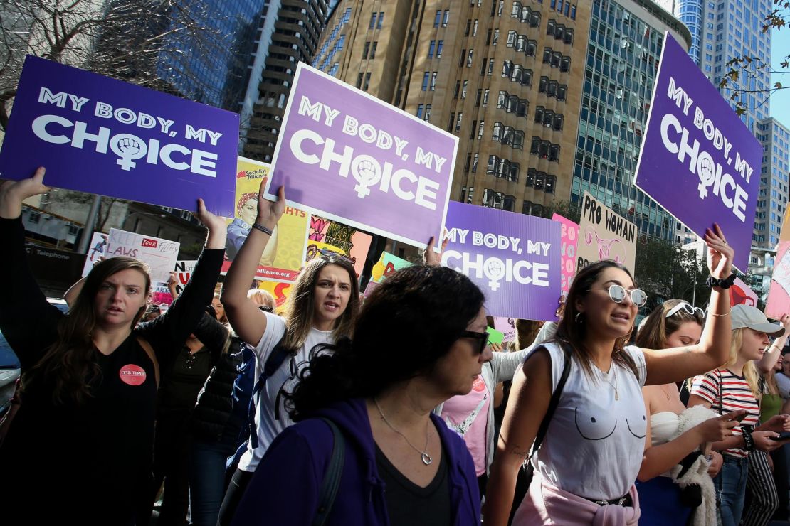 Protesters hold signs and chant during a rally for reproductive rights on June 9, 2019, in Sydney, Australia. 