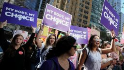 Protesters hold signs and chant during a rally for reproductive rights on June 09, 2019, in Sydney, Australia. 
