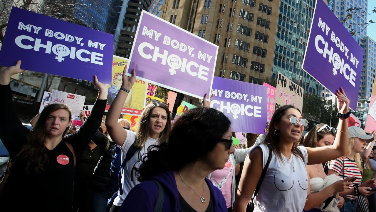 Protesters hold signs and chant during a rally for reproductive rights on June 9, 2019, in Sydney, Australia. 