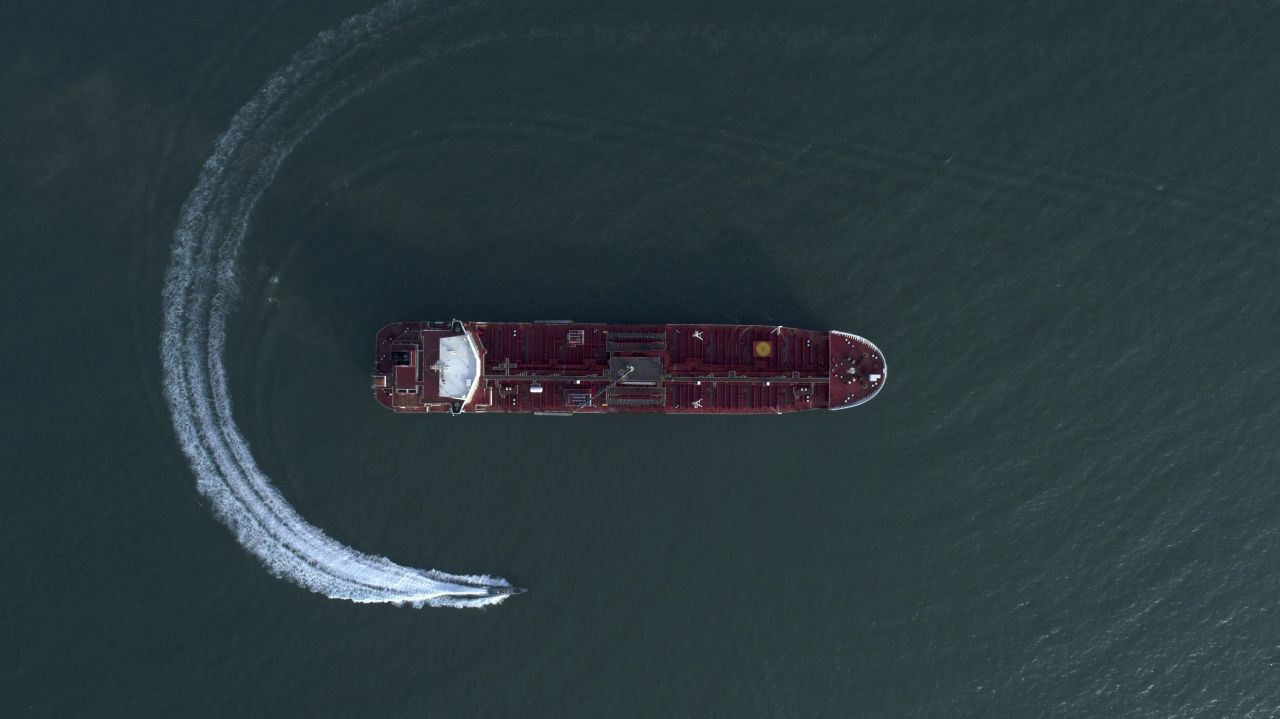 This aerial photo, taken on Sunday, July 21, shows an Iranian speedboat moving around the British-flagged oil tanker Stena Impero, which <a href="https://www.cnn.com/2019/07/19/middleeast/british-tanker-seized-iran-intl/index.html" target="_blank">Iran seized in the Strait of Hormuz</a> two days prior. Iran accused the tanker of "violating international regulations." The United Kingdom has said the tanker was within Omani territorial waters exercising "the lawful right of transit passage in an international strait." Days later, Iranian President Hassan Rouhani appeared to signal that his country <a href="https://www.cnn.com/2019/07/25/middleeast/uk-tankers-hormuz-gbr-intl/index.html" target="_blank">might be willing to release the vessel</a> in exchange for the UK's release of a detained Iranian tanker.