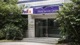 Signage is displayed atop a FedEx Corp. service center in Shanghai, China, on Sunday, June 2, 2019. China targeted FedEx Corp. in its escalating trade war with the U.S., giving a hint of the kind of foreign companies it may blacklist as "unreliable." Photographer: Qilai Shen/Bloomberg via Getty Images