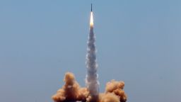 TOPSHOT - A rocket carrying two satellites lifts off from the Jiuquan Satellite Launch Centre in northwest China's Gansu province on July 25, 2019. - A Chinese startup successfully launched the country's first commercial rocket capable of carrying satellites into orbit on July 25, as the space race between China and the US heats up. (Photo by STR / AFP) / China OUT        (Photo credit should read STR/AFP/Getty Images)