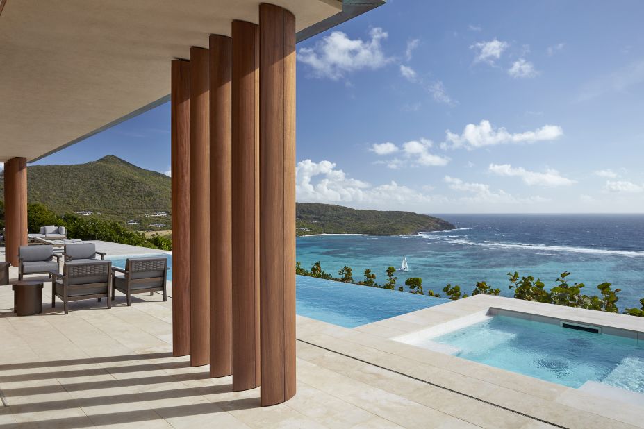 <strong>Private patios: </strong>Villa patios overlook the turquoise waters -- pool and surf.