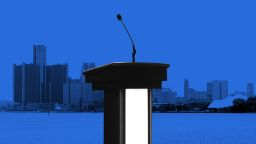 RESTRICTED 20190728 detroit debate podium illo THE POINT