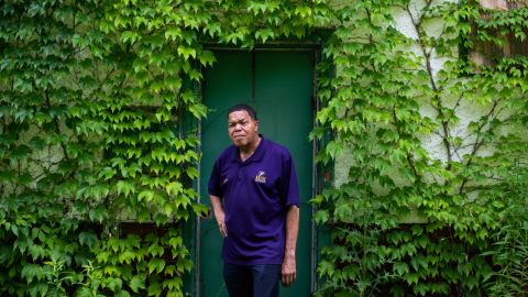 Luther Keith, the executive director of the non-profit Arise Detroit, stands on an empty lot where his childhood home once stood. The home is said by neighbors to have burned down in the '90s.