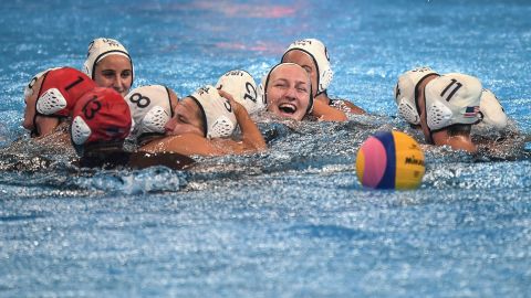 Team USA celebrates their victory over Spain at the at the 2019 FINA World Championships. 