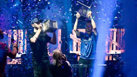 Jul 26, 2019; Flushing, NY, USA; RL Grime (left) and Airwaks (right) celebrate after winning the Pro-AM during the Fortnite World Cup Finals e-sports event at Arthur Ashe Stadium. Mandatory Credit: Catalina Fragoso-USA TODAY Sports
