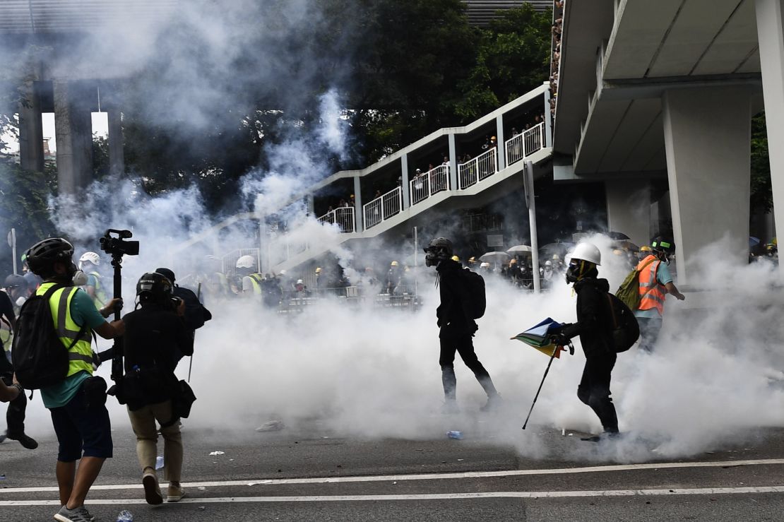 Hong Kong police fire tear gas during demonstration in the district of Yuen Long in Hong Kong on July 27, 2019. 