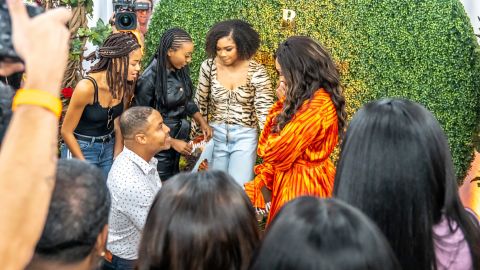 Mike Hill popped the question to Cynthia Bailey along with their daughters from prior relationships. 