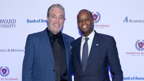 Joel Freedman (left) poses for a photo with the president of Howard University, Wayne A.I. Frederick in January 2018. Freedman's company, American Academic Health System, previously managed Howard University Hospital, but the university has said it will not renew the contract, which ended in March.