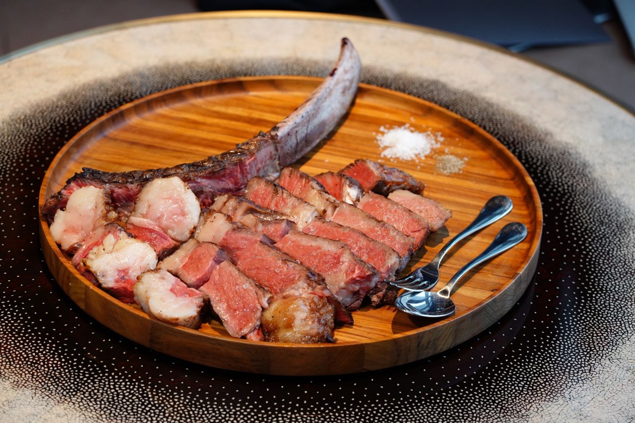<strong>Australian tomahawk:</strong> Mains include this juicy Australian wagyu tomahawk, served with Thai nahm jim sauce and brown butter. 