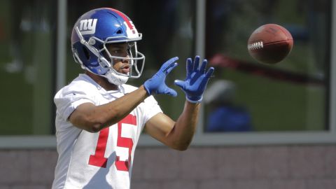 New York Giants' Golden Tate runs a drill during an NFL football minicamp.
