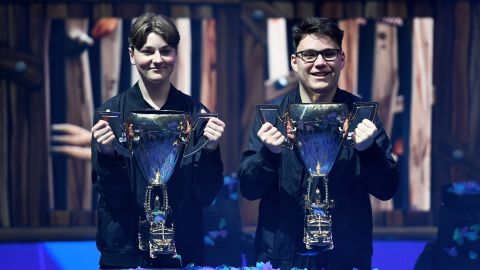 NEW YORK, NEW YORK - JULY 27: Emil "Nyhrox" Bergquist Pedersen (L) and David "Aqua" Wang (R) pose with the trophy after winning the Duos competition during day two of the Fortnite World Cup Finals at Arthur Ashe Stadium on July 27, 2019 in the Queens borough of New York City. (Photo by Sarah Stier/Getty Images)
