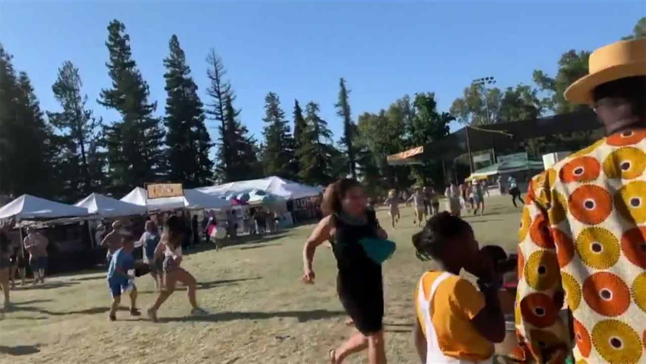 In this image, taken from a video  posted on social media, people scramble amid reports of the shooting.