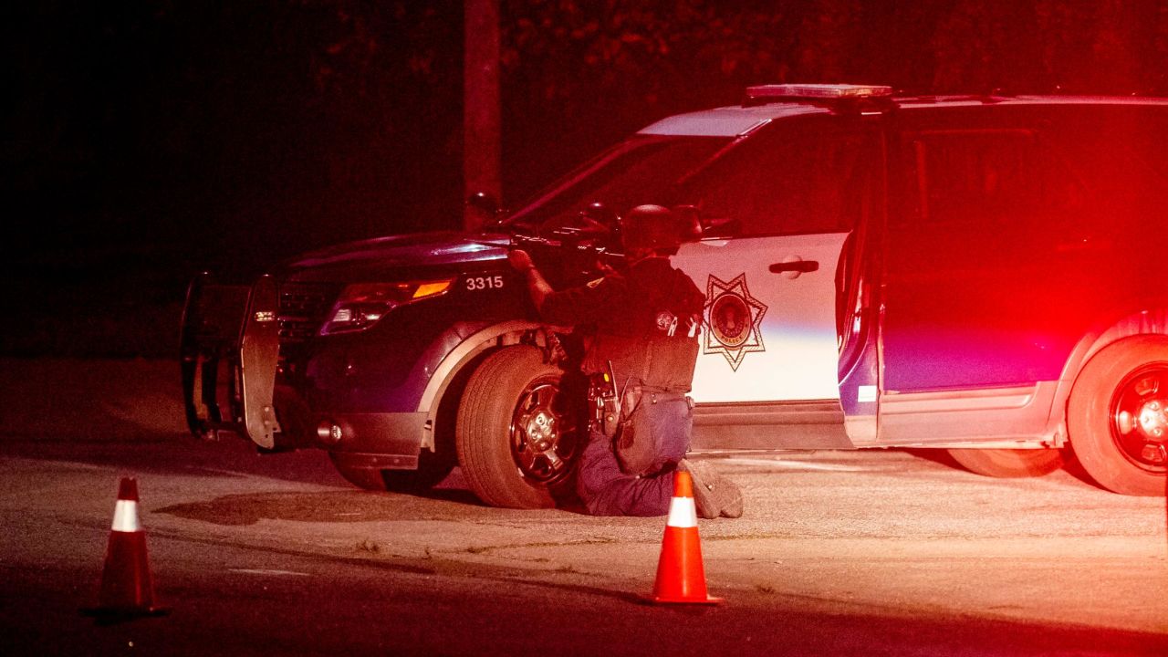 Police stay focused on a target after a deadly shooting at the Gilroy Garlic Festival in Northern California.
