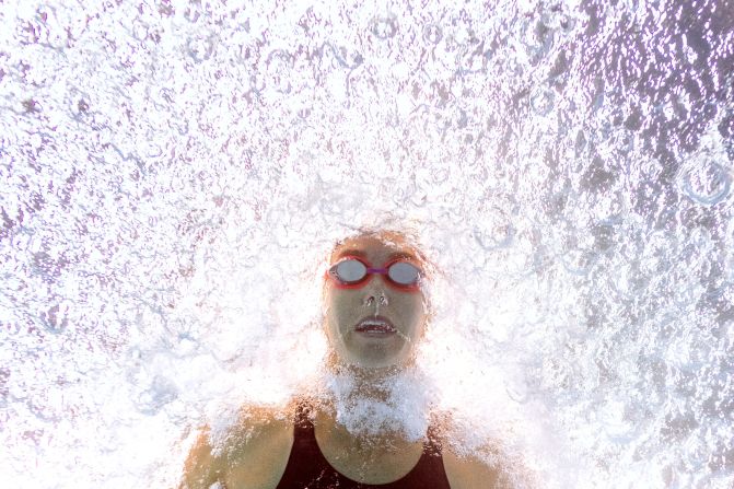 Australia's Emma McKeon competes in a heat for the women's 100m butterfly during the FINA World Swimming Championships in Gwangju, South Korea, on Sunday, July 21.