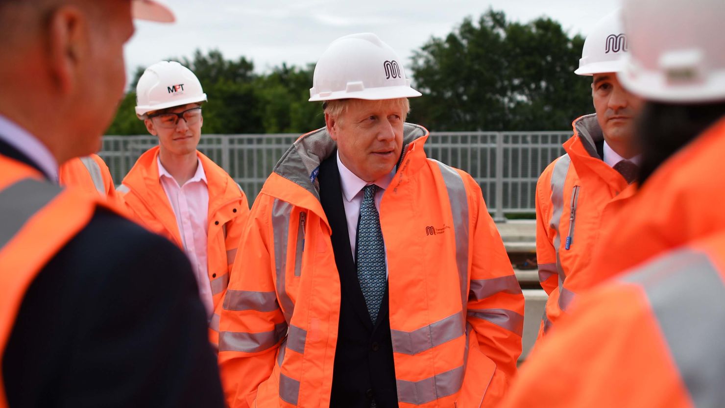 Britain's Prime Minister Boris Johnson meets engineering graduates in Manchester, England.
