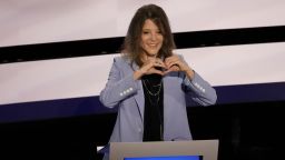 Democratic presidential candidate Marianne Williamson gestures a heart sign during a walkthrough before tonight's presidential debate at the Fox Theater in Detroit, Tuesday, July 30, 2019.