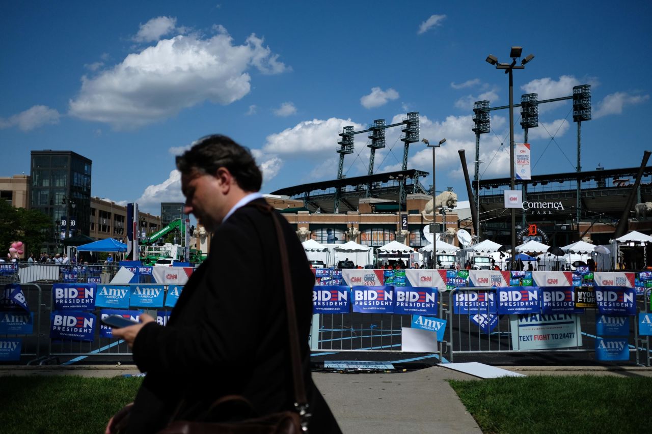 Campaign signs are seen outside the debate venue early on Tuesday.