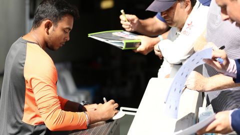 Prithvi Shaw signs autographs during the first Test in the series between Australia and India at Adelaide Oval on December 10, 2018.