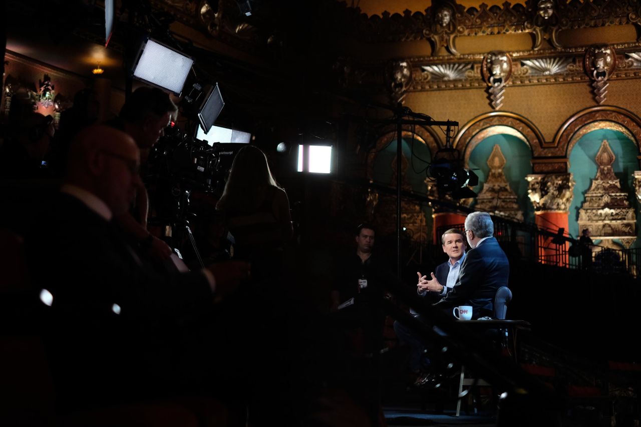 US Sen. Michael Bennet talks to Wolf Blitzer before Tuesday's debate. Bennet is one of the candidates taking part in Wednesday's debate.