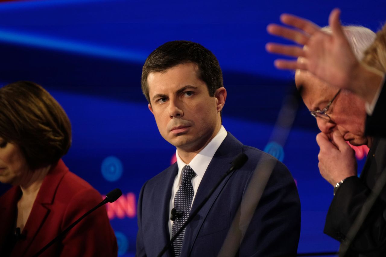 Buttigieg looks on during the debate. <a href="https://www.cnn.com/politics/live-news/democratic-debate-july-30-2019/h_b149241e0efea9ade0ace4e9630fb41b" target="_blank">He vowed to withdraw troops from Afghanistan</a> in his first year of office.