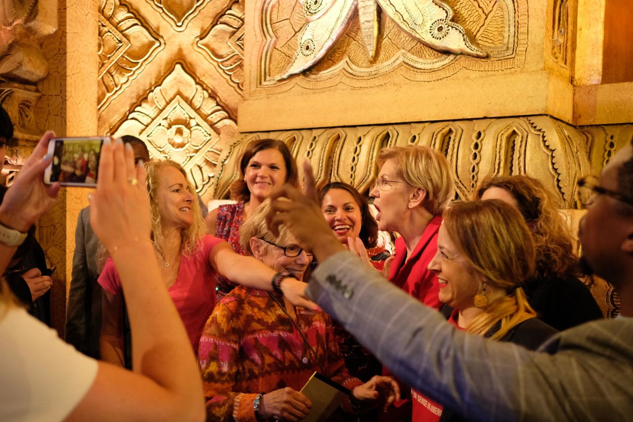 Warren speaks with supporters after the debate Tuesday.