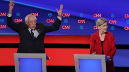 DETROIT, MICHIGAN - JULY 30: Democratic presidential candidate Sen. Bernie Sanders (I-VT) (L) gestures while former Colorado governor John Hickenlooper (R) speaks and Sen. Elizabeth Warren (D-MA) and former Texas congressman Beto O'Rourke listen during the Democratic Presidential Debate at the Fox Theatre July 30, 2019 in Detroit, Michigan. 20 Democratic presidential candidates were split into two groups of 10 to take part in the debate sponsored by CNN held over two nights at Detroit's Fox Theatre.  (Photo by Justin Sullivan/Getty Images)
