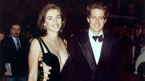 British actor Hugh Grant and his girlfriend Elizabeth Hurley attend the premiere of Grant's latest film, 'Four Weddings and a Funeral' in London, 11th May 1994. (Photo by Gareth Davies/Mission Pictures/Getty Images) *** North American Sales Only ***  