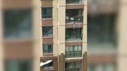 A 3-year-old boy fell from a six-storey balcony in Chongqing, China, and was saved by the crowd below.