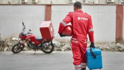 Joseph Kalu, motorbike dispatcher for Lifebank is preparing for one of his deliveries