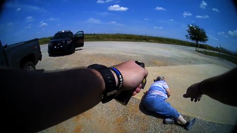 The officer fired his taser at the Debra Hamil as she lay on the ground.