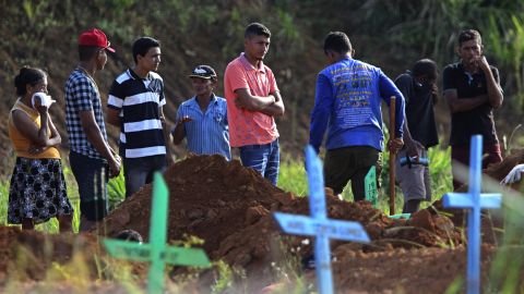 Family members attend the funeral of a prisoner who was killed during the riot in Altamaria.