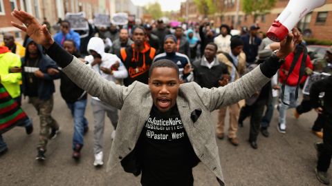 Demonstrators march toward a West Baltimore police station during a protest after the death of Freddie Gray in April 2015.