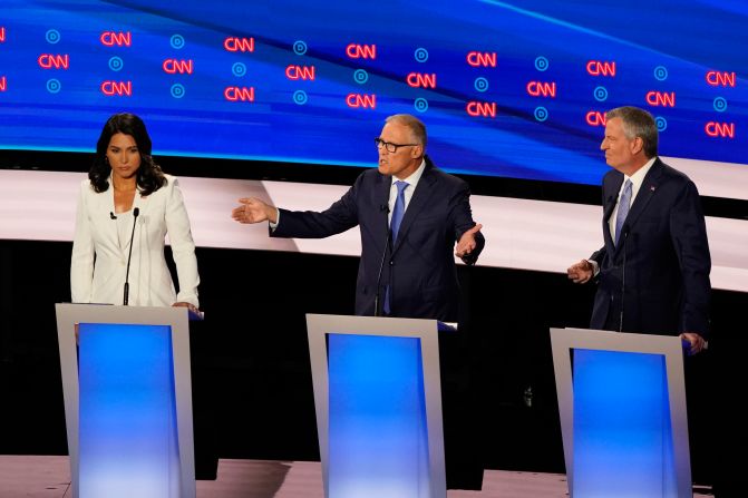 Inslee participates in the CNN Democratic debates in July 2019. "The time is up," he said, referring to climate change. <a href="index.php?page=&url=https%3A%2F%2Fwww.cnn.com%2Fpolitics%2Flive-news%2Fdemocratic-debate-july-31-2019%2Fh_b53ac5038556ee8fa3e5f7388e965e02" target="_blank">"Our house is on fire." </a>