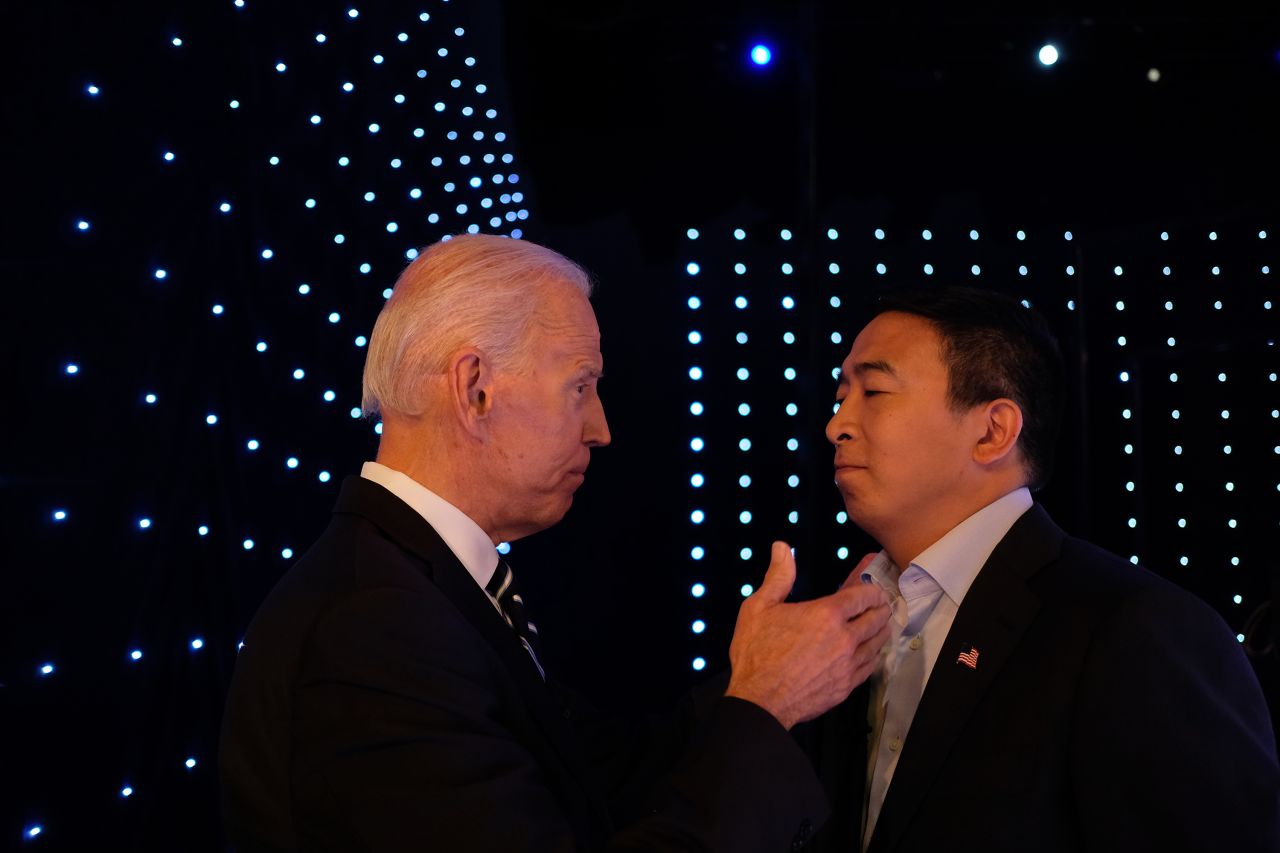 Biden and Yang talk backstage.