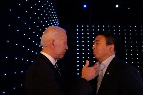 Yang and former Vice President Joe Biden talk backstage at the CNN Democratic debates in July 2019.