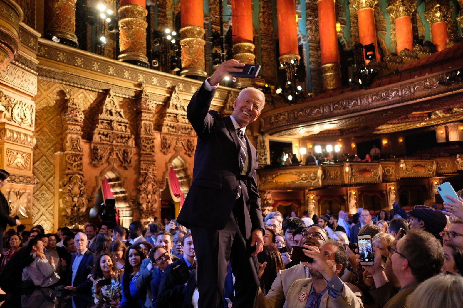 Biden takes a selfie with supporters in Detroit after CNN's Democratic debates in July 2019.