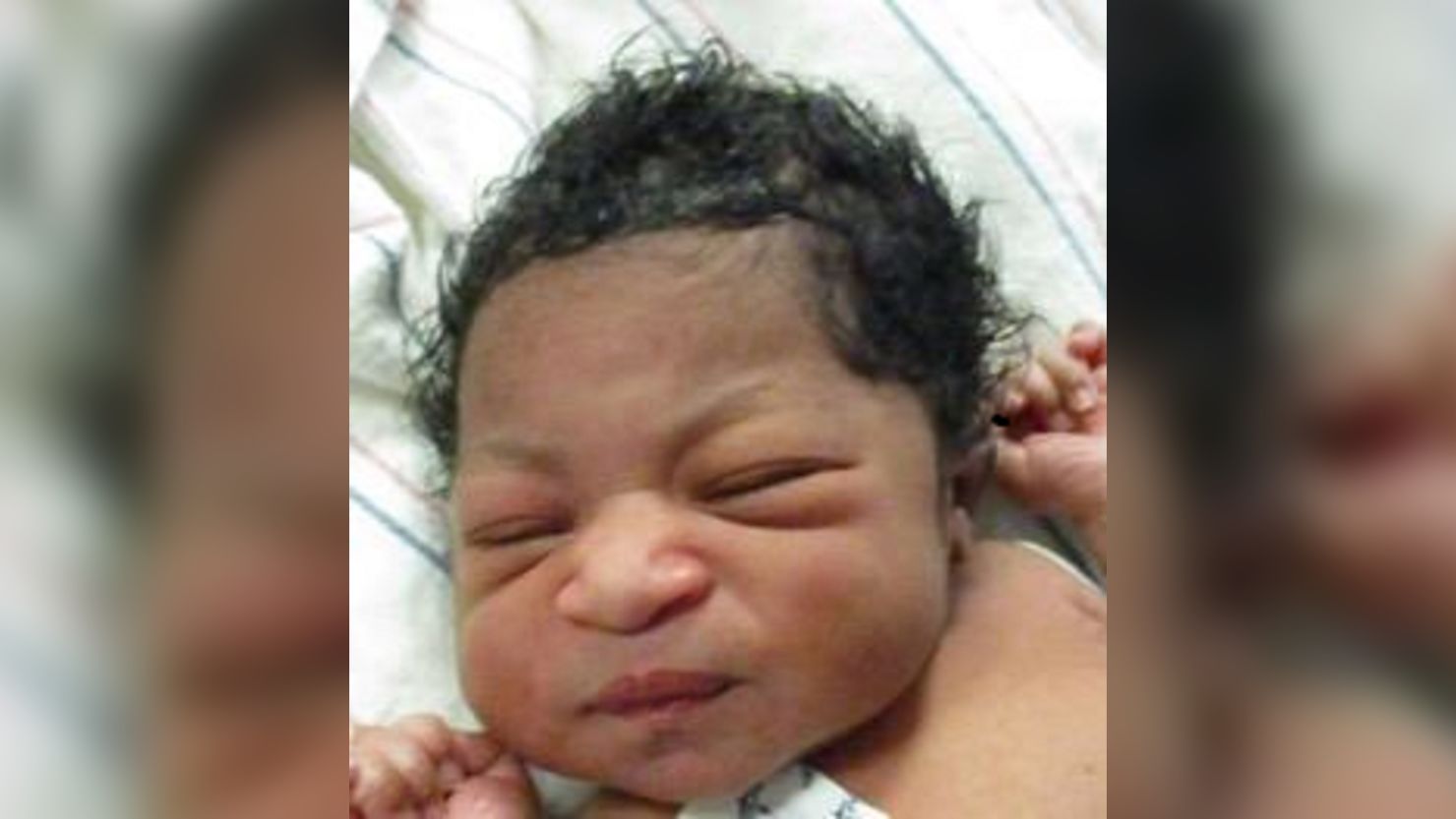 A swaddled baby with her umbilical cord attached was found on a porch in Pennsylvania--- and police are looking for her parents. 