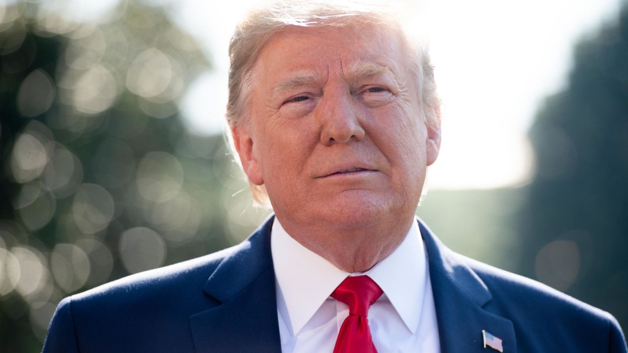 US President Donald Trump speaks to the media prior to departing from the South Lawn of the White House in Washington, DC, July 30, 2019, as he travels to the 400th anniversary of Jamestown. (Photo by SAUL LOEB / AFP)