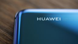 The Huawei Technologies Co. branding is displayed on the company's P20 Pro smartphone in an arranged photograph taken in Hong Kong, China, on Monday, May 20, 2019. Top U.S. corporations from chipmakers to Google have frozen the supply of critical software and components to Huawei, complying with a Trump administration crackdown that threatens to choke off China's largest technology company. Photographer: Justin Chin/Bloomberg via Getty Images