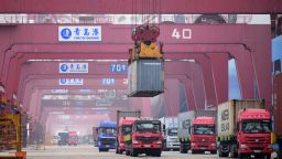 QINGDAO, CHINA - JUNE 28: A shipping container is unloaded onto a truck at Qingdao Port on June 28, 2019 in Qingdao, Shandong Province of China. China's import and export of trade in goods reached 12.1 trillion yuan in the first five months of this year, increasing 4.1 percent year-on-year, according to the General Administration of Customs. (Photo by Yu Fangping/VCG via Getty Images)