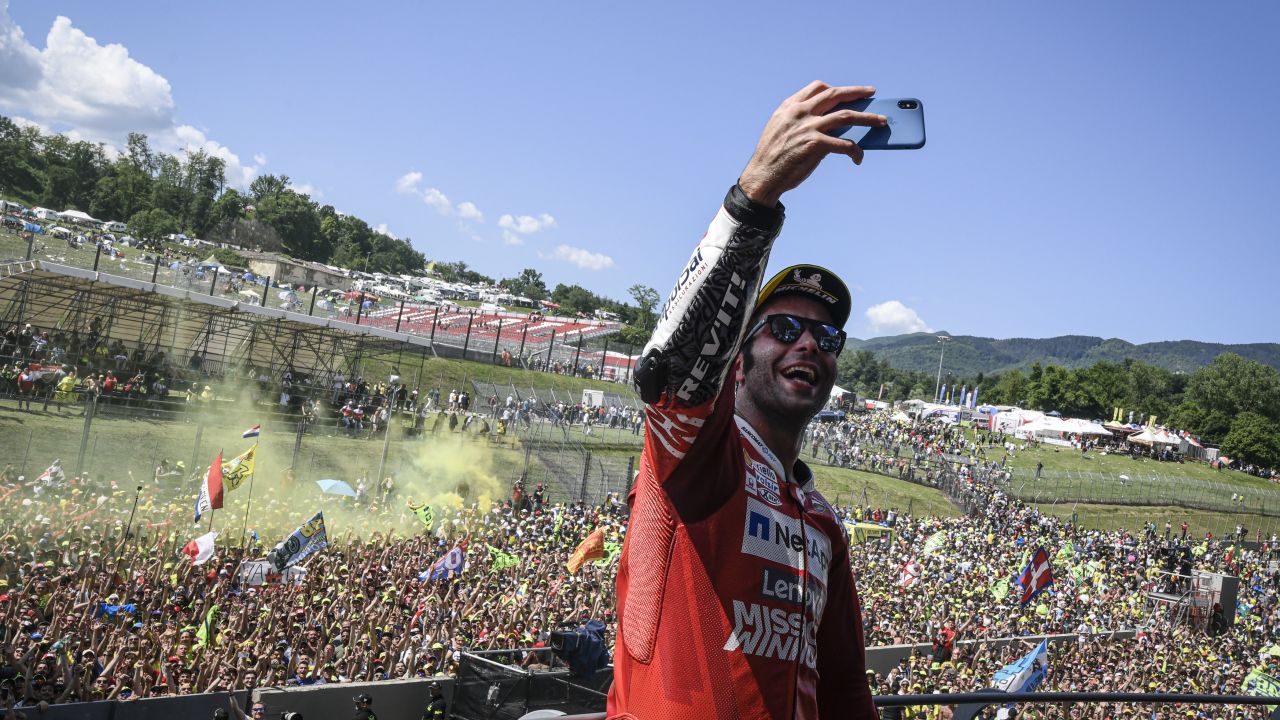 Danilo Petrucci takes a celebration selfie on the Mugello Podium.