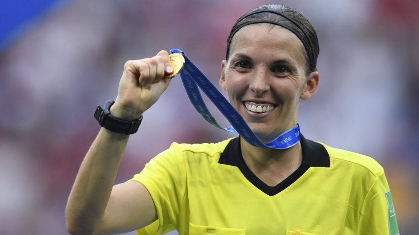 TOPSHOT - French referee Stephanie Frappart shows her medal after the France 2019 Womens World Cup football final match between USA and the Netherlands, on July 7, 2019, at the Lyon Stadium in Lyon, central-eastern France. (Photo by CHRISTOPHE SIMON / AFP)        (Photo credit should read CHRISTOPHE SIMON/AFP/Getty Images)